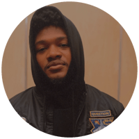 a black man wearing a hoodie